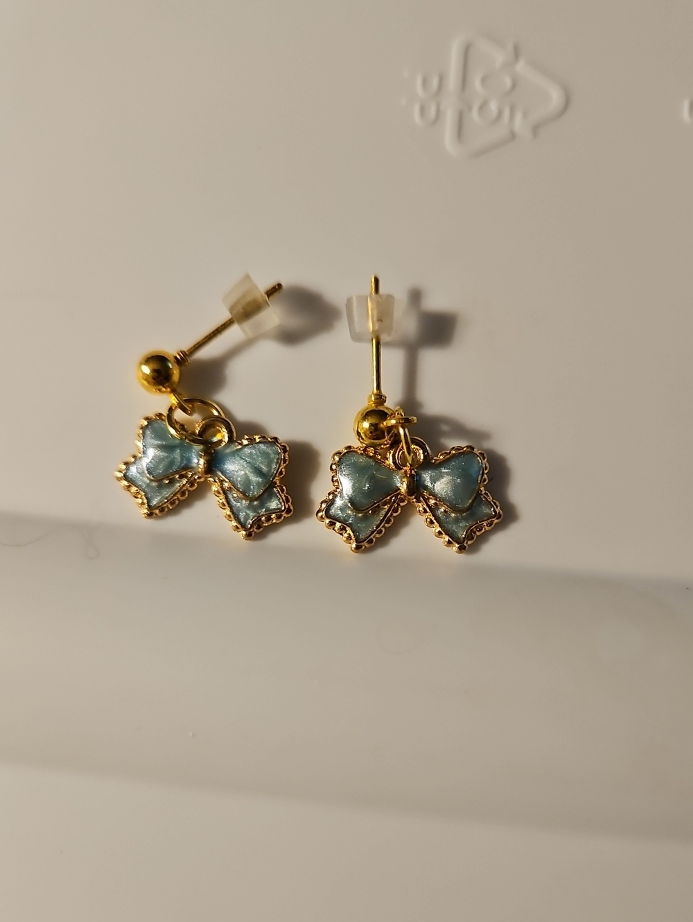 Gold-Tone Blue Bow Drop Stud Earrings